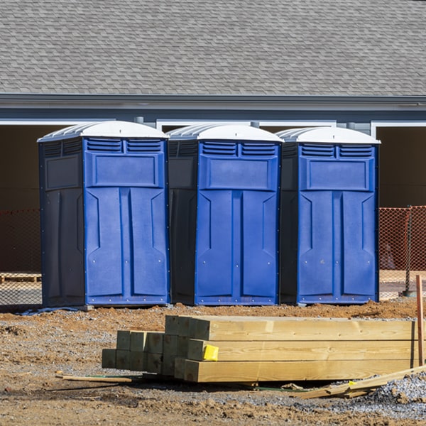 what is the cost difference between standard and deluxe porta potty rentals in Pebble Beach